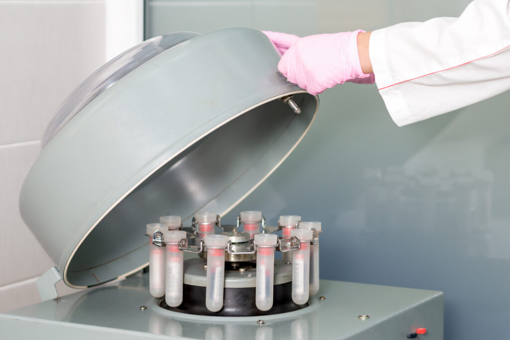 centrifuge tubes in sample processing step for DNA and RNA purification workflows