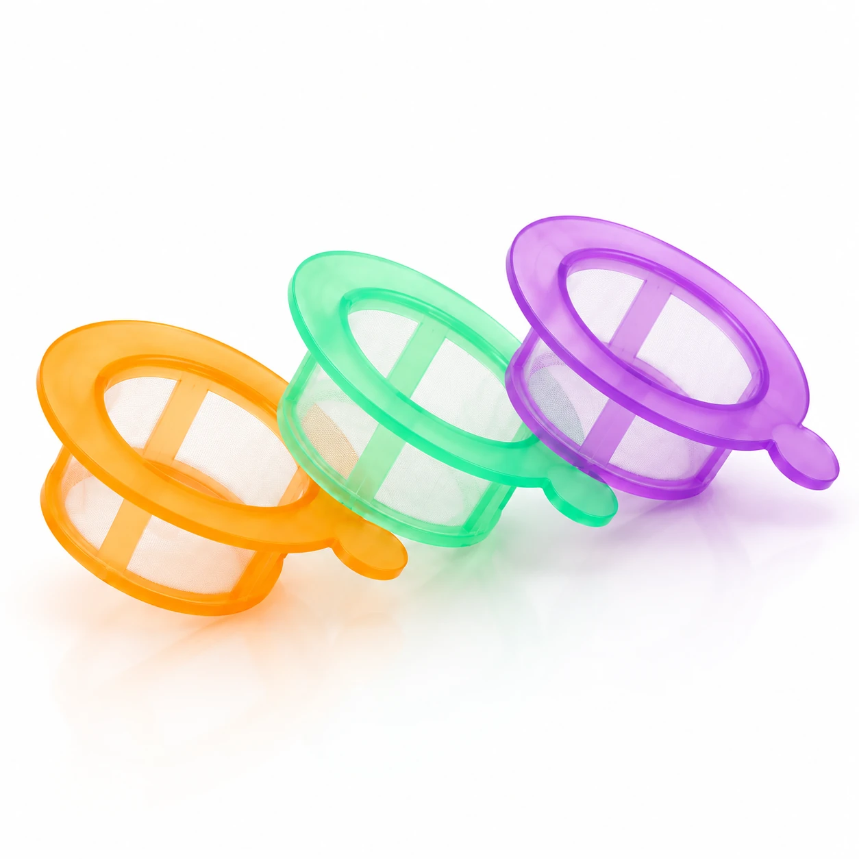 Orange, green and purple nylon mesh cell strainers arranged at an angle
